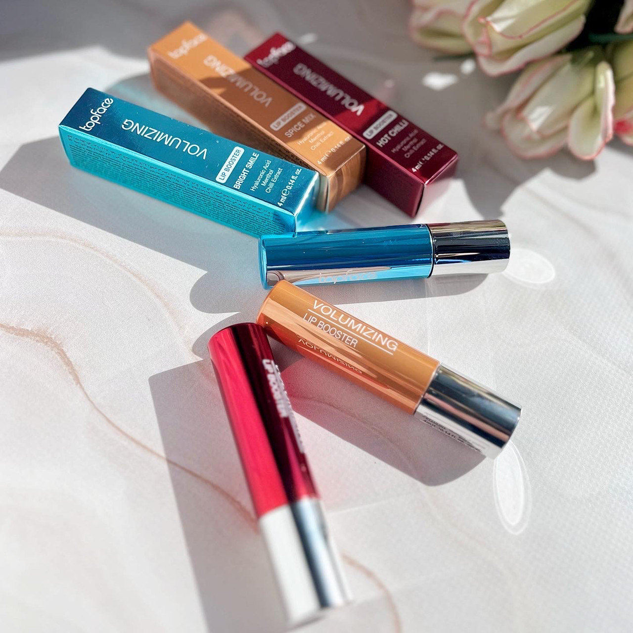 حجم دهنده لب lip booster تاپ فیس