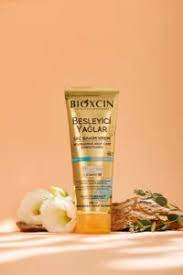 کرم مو داخل حمام حاوی 9روغن مغذی مناسب موهای خشک و آسیب دیده بیوکسین 250 میل